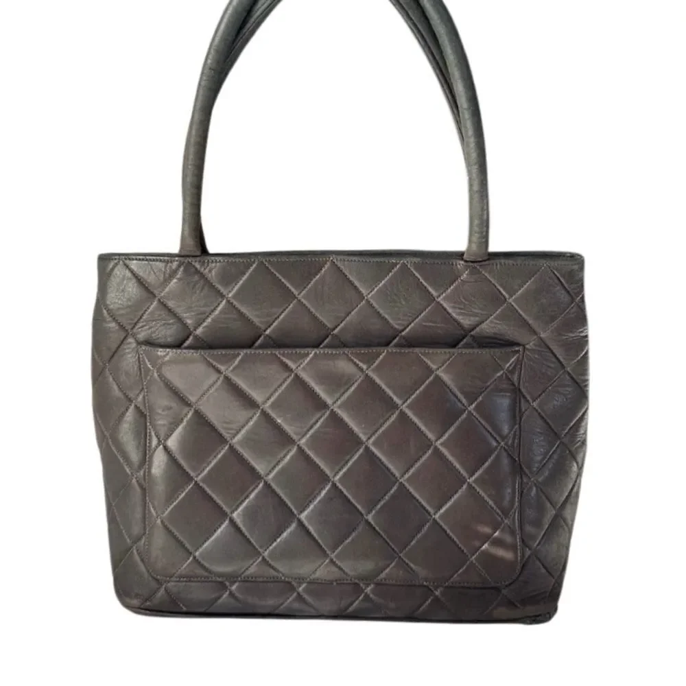 CHANEL Brown Quilted Shoulder Bag with Gold Accents
